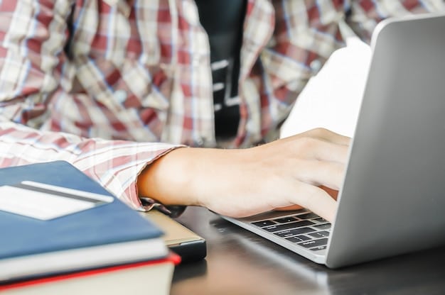 A close-up shot of a student's hands typing on a laptop, with a scholarship application form visible on the screen. The focus is on the act of applying and the importance of technology in accessing scholarship opportunities.