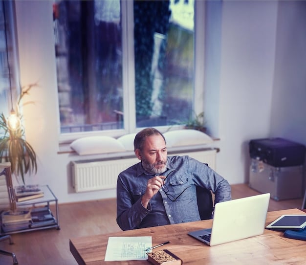 A person sitting at a desk, thoughtfully completing a career aptitude test on a laptop. The room is well-lit and serene, symbolizing focused self-assessment