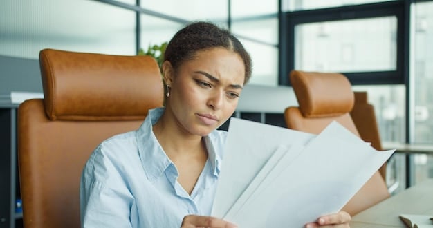 A person reviewing a document titled 