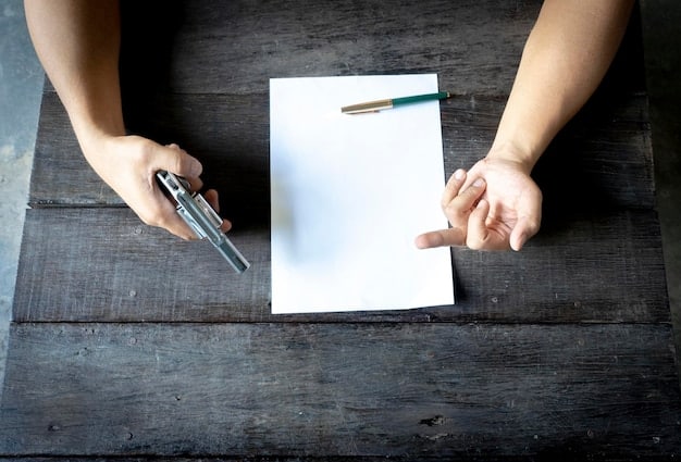 A close up of a denial letter with a hand holding a pen, highlighting the section outlining the appeal process and deadlines.