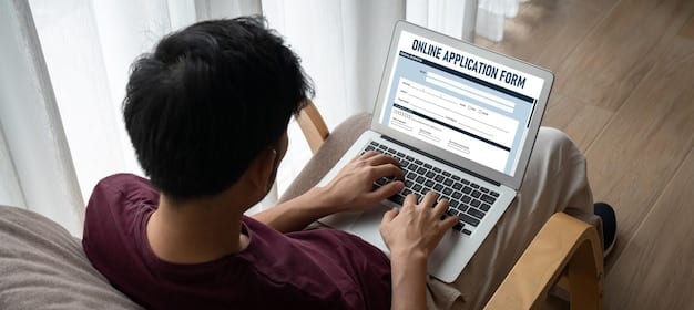 A person working on their laptop, filling out an online form to appeal a denied government benefits claim.