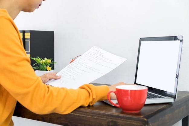 A person confidently writing an appeal letter at a desk, with organized documents and a laptop in the background.