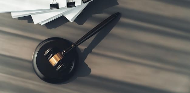 A close-up shot of a gavel hitting a sound block, symbolizing regulatory changes impacting banking policies related to overdraft fees. The background is blurred, focusing attention on the gavel.