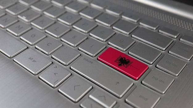 A close-up of a computer screen displaying a fake virus alert, with a hand reaching out to click on a suspicious link.