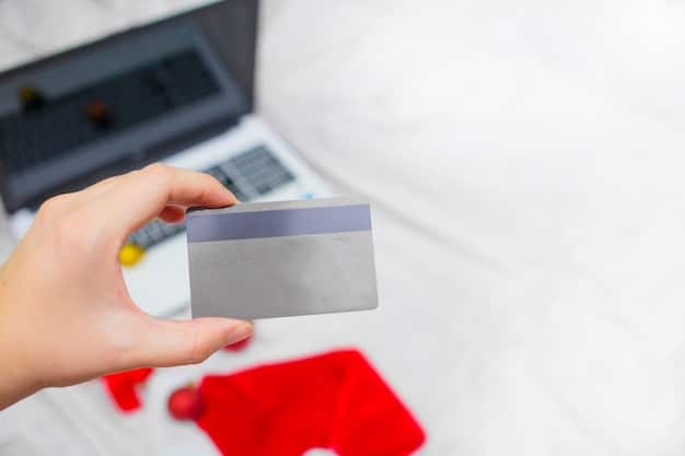 A close-up of hands holding credit cards, with a calculator and financial documents subtly blurred in the background, symbolizing debt management.