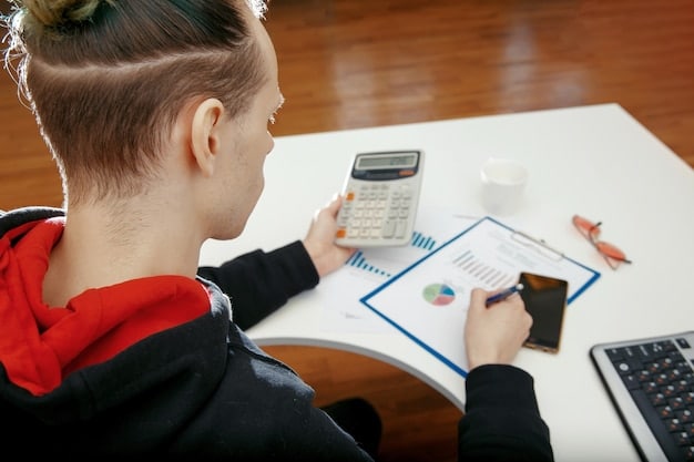 A person using a calculator and reviewing financial documents, highlighting the importance of budgeting and cost assessment in financial planning.